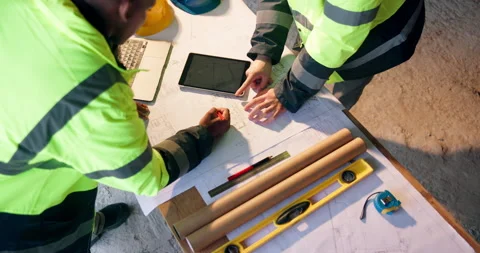 Architect, tablet screen and hands with blueprint on construction site, talk or Stock Footage 337014500
