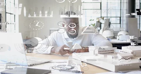 Architect tapping watch, activating holographic data, inspecting model and Stock Footage 314398311
