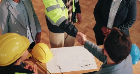 Architect, team and applause with handshake for construction deal, agreement or Stock Footage 341550205