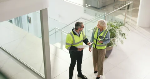 Architect, team or blueprint with discussion in building for renovation design, Stock Footage 316306866