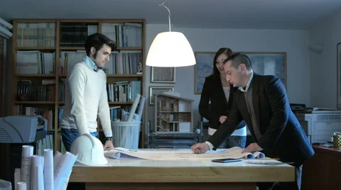 Architect team work: architect studio at work on a blueprint Video stock 49773170