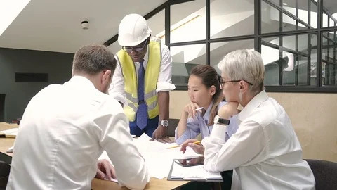 Architect team work with new startup project at desk in lighting room. Video stock 98280758