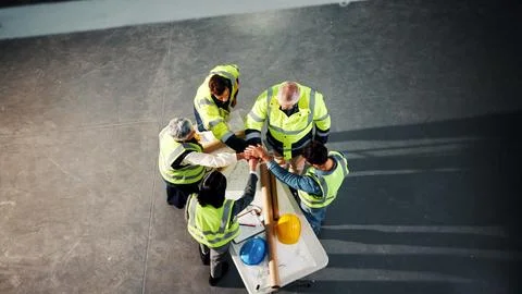 Architect, teamwork or pile hands at construction site for support, solidarity Stock-Fotos