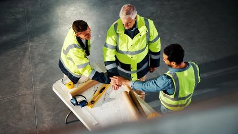 Architect, teamwork or stack hands at construction site for support, solidarity Stock Photos