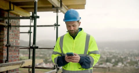 Architect, texting and man with phone on construction site, outdoor or Vídeos de archivo 337625407