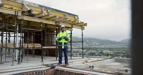 Architect, thinking and man with tablet on roof, building inspection or planning Stock Photos