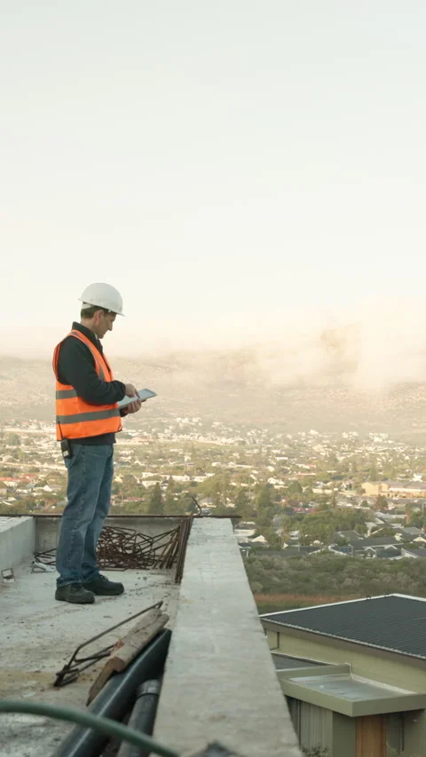 Architect, thinking and tablet with man on rooftop for property, engineer and Stock Footage 340970524