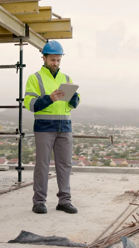 Architect, typing and man with tablet in city, research or planning for property Video stock 337992600