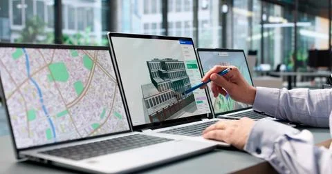 Architect Uses 3D BIM Software To Design Smart Urban City Plans. Stock Photos