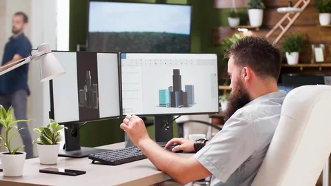 Architect using a 3D software to show the new building Stock Footage 110480326