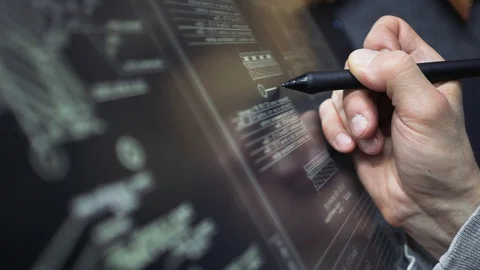 Architect Using creative pen display Tablet Working with drawings in office Stock Footage 103317831