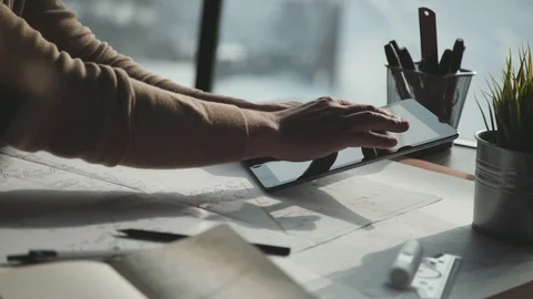 Architect using tablet pc in work. Engineer using Tablet PC. Close up Stock Footage 87967786