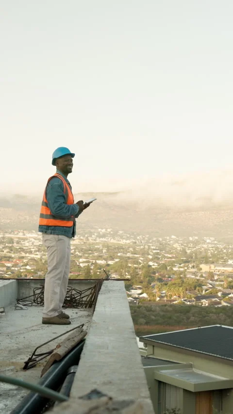 Architect, vision and tablet with black man on rooftop for property, engineer Stock Footage 340968525