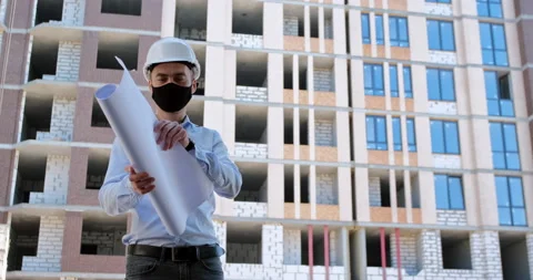 An architect in a white protective helmet Vidéo 144898738