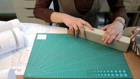 Architect woman presenting colors from color pallet Stock Footage