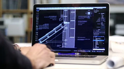 Architect at work with a cad software with a laptop computer Stock Footage 49811138