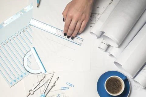 Architect working on blueprint. Architects workplace Stock Photos