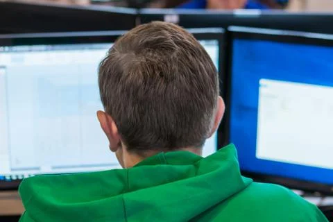 Architect working with blueprint, blurry background - back view Stock Photos