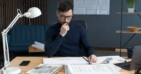 Architect working on Blueprint with special tools and a pencil, close up.A young Stock Footage 126158882