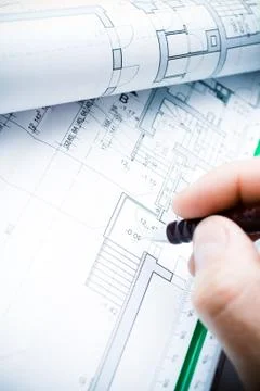 Architect working on blueprints Stock Photos