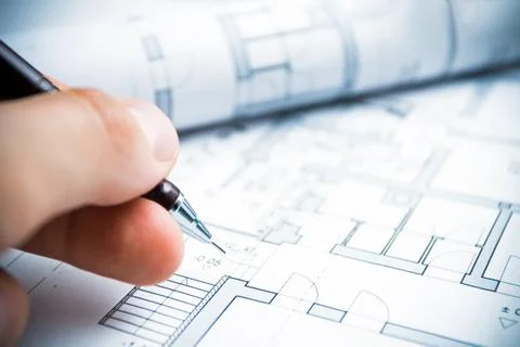 Architect working on blueprints Stock Photos