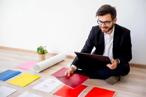 Architect working with construction plans Stock Photos
