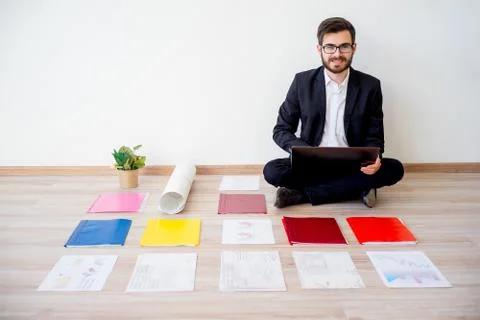 Architect working with construction plans Stock Photos