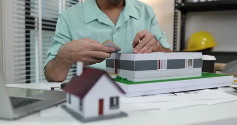 An architect is working in his office Stock-Footage 342242814