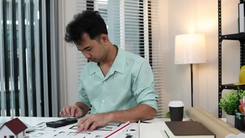 An architect is working in his office Stock-Footage 342242976
