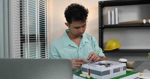 An architect is working in his office Stock Footage 342243014