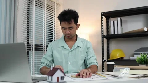 An architect is working in his office Stock Footage 342243073
