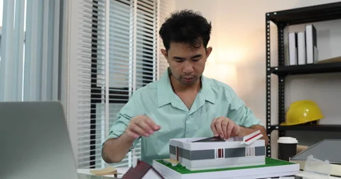 An architect is working in his office Stock Footage 342243133