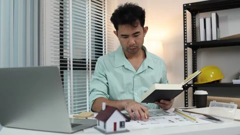 An architect is working in his office Stock Footage 342243190