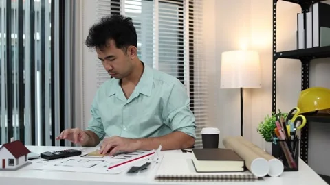 An architect is working in his office Stock Footage 342243204