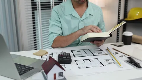 An architect is working in his office Stock-Footage 342243220