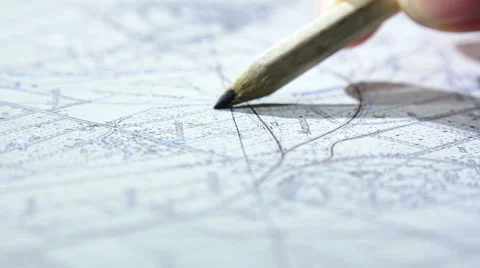 Architect working on a map with a pencil Stock Footage 46941578