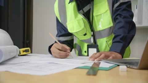 Architect working by notebook computer in office Stock Footage 159050429