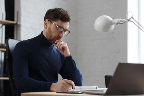 Architect working in office with blueprints.Engineer inspect architectural plan Stock Photos