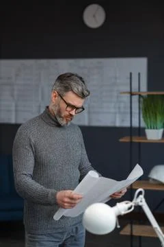 Architect working in office with blueprints.Engineer inspect architectural plan Foto stock