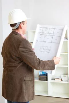 Architect working with plan Stock Photos