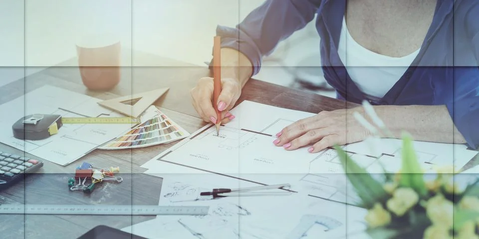 Architect working on plans, light effet, geometric pattern Foto stock