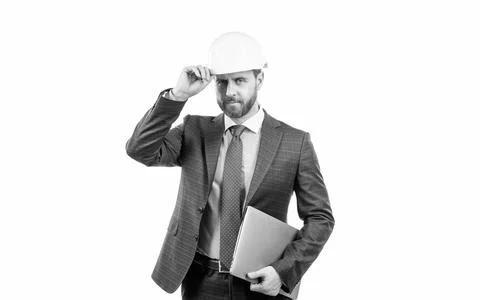 Architect working on project. chief engineer in hardhat hold computer. mature Stock Photos