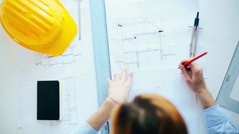 Architect working on project Stock Footage 72589720