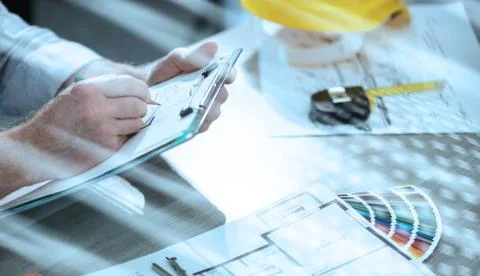 Architect working on a project; light effect Stock-Fotos