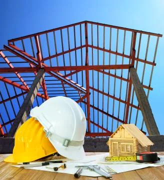 Architect working table hard hat house model plan sheet and writing equipment Stock-Fotos