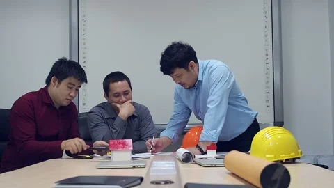 Architect working together in a office. Architect discuss with engineer. Video stock 157150642