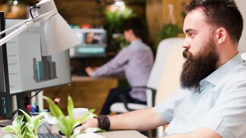 Architect works in 3D software to improve buildings structure Stock Footage 110474533