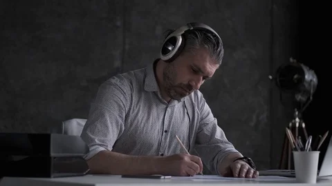 Architect works with documents and drawings in the office. middle-aged man Stock Footage 107769180