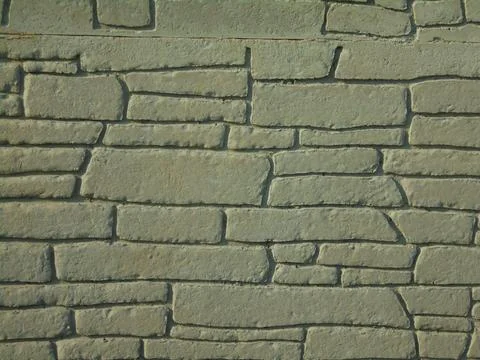 Architectonic pattern with irregular stone bricks. 스톡 사진