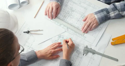 Architects are working on a building construction sketches design project.  Stock Footage 156467865